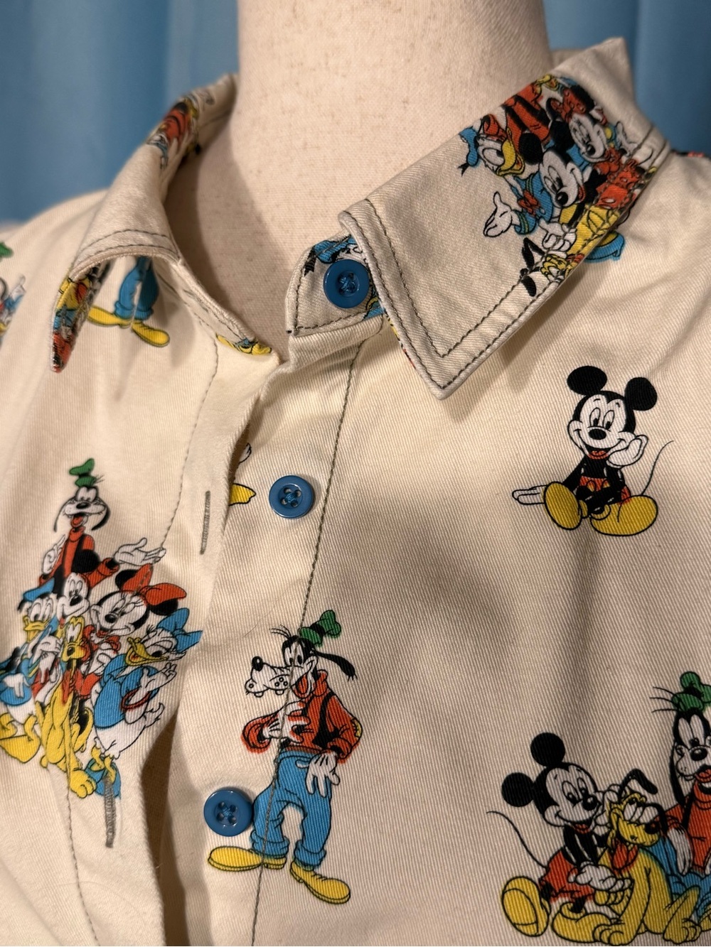 Disney Parks Mickey and Friends cream medium weight button down- blue button- L